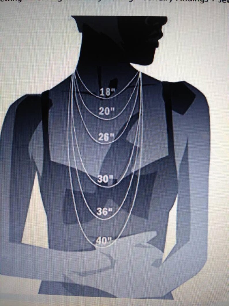 May include: A grayscale illustration of a person's upper body, showcasing necklace lengths. The image displays necklaces of 18", 20", 26", 30", 36", and 40" lengths, providing a visual guide for necklace sizing. The person is wearing a tank top.