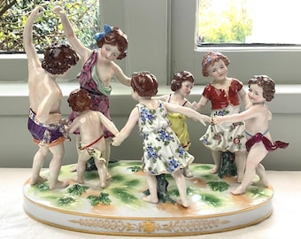 Antique German porcelain group of dancing children by Anton Muller Volkstedt c. 1915-20