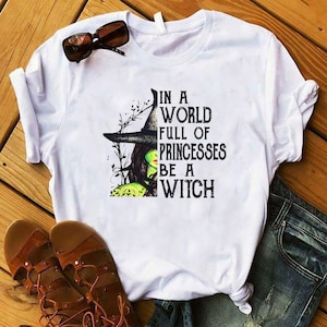 In A World Full Of Princesses Be A Witch Shirt, Funny Halloween Shirt, Witches Wicca Shirt, Quarantine Halloween, Funny Halloween Party Tee