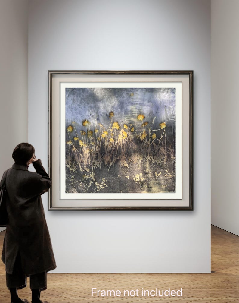 May include: A square wall art print featuring a botanical composition of yellow wildflowers against a dark, textured blue and grey background. The artwork is displayed within a dark brown frame and includes the text Frame not included.
