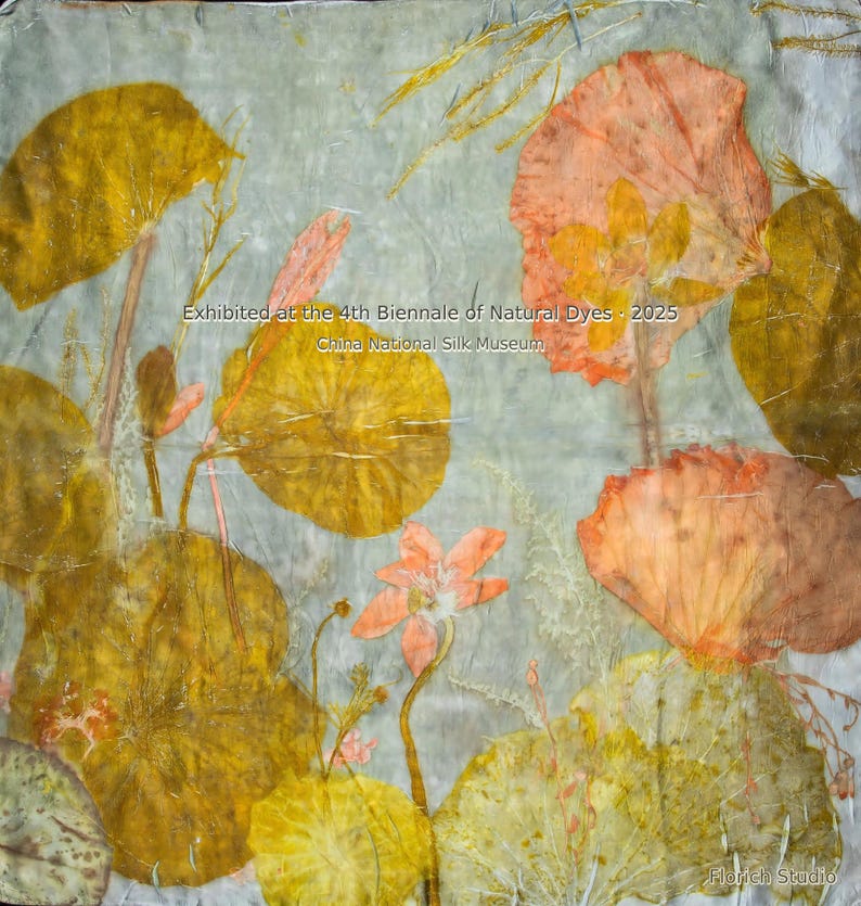 May include: A square textile piece featuring botanical prints of yellow and orange leaves and flowers on a pale grey background. The text reads: Exhibited at the 4th Biennale of Natural Dyes &middot; 2025 China National Silk Museum and Florich Studio.