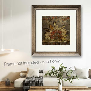 May include: A square scarf featuring a dark, muted background with a central botanical print of stylized leaves and flowers in shades of rust, gold, and olive green. The design includes a row of small circular motifs along the top edge.