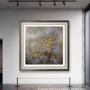 May include: A square textile scarf featuring a printed still life composition of a brown vase filled with yellow flowers. The background displays a mottled, watercolor-style pattern in shades of green, grey, and purple, with loose yellow petals.