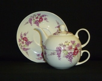 Juego de té de porcelana china con anémona y glicina para una persona con platillo