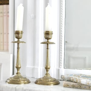 A pair of vintage Bronze candlesticks (XIX)