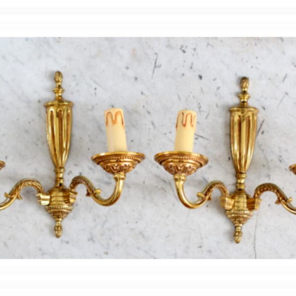 Paire de anciennes appliques murales en bronze