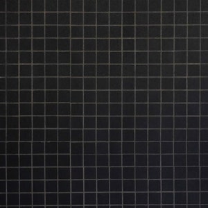 May include: A black tiled wall with a grid pattern.