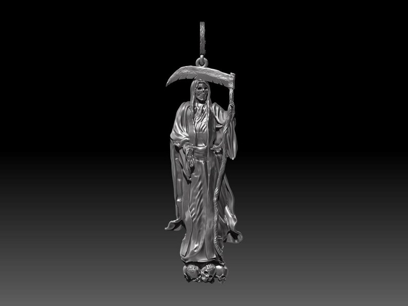 May include: A silver pendant depicting the Grim Reaper, holding a scythe. The figure is draped in a hooded robe and stands atop three skulls. The pendant has a loop for a chain.