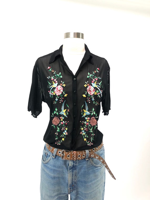 Embroidered black blouse