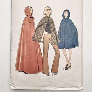 May include: Vintage sewing pattern for three different styles of capes. The pattern is for a size 16 with a bust measurement of 38 inches. The pattern is from Style magazine and is numbered 3859.