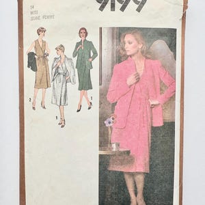 May include: Simplicity sewing pattern number 9199 for a miss's dress and jacket. The pattern shows three different styles of dresses, one in pink, one in green, and one in brown. The pattern is for sizes 14.