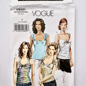 May include: A Vogue V8251 sewing pattern envelope featuring illustrations of four different sleeveless tops. The designs include a tie-front top, a halter top, and draped neck styles. The envelope displays size charts, a barcode, and the text VOGUE.