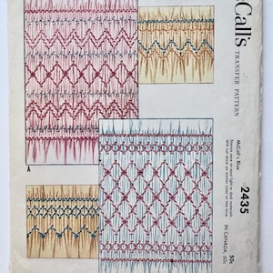 May include: Vintage McCall's Transfer Pattern featuring smocking bandings. The pattern includes detailed diagrams of various smocking designs, with text that reads "Two Regular Smocking Bandings - 4" Deep". The pattern is marked with the number 2435.