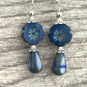 Royal Satin Blue hibiscus flower with a Picasso finish and Blue wash with a Glass Blue and White Sliced Picasso Teardrop Bead Earrings