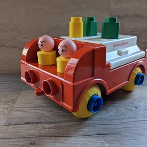 Vintage Johnson & Johnson Fire Truck with 2 people and 3 Shapes