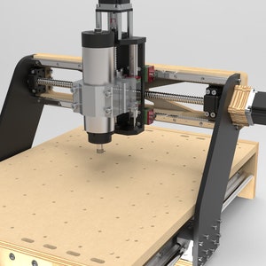May include: A CNC router with a black and silver spindle, a black motor, and a wooden work surface. The router is mounted on a black frame with a wooden base.