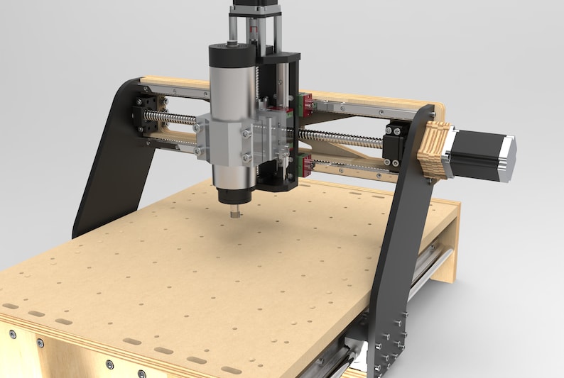 May include: A CNC router with a black and silver spindle, a black motor, and a wooden work surface. The router is mounted on a black frame with a wooden base.