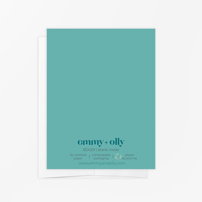May include: A teal greeting card with a solid color front and text on the back. The back features the text emmy + olly, BD029 | blank inside, fsc certified paper, compostable packaging, please recycle me, and www.emmyandolly.com in dark teal.