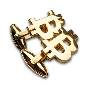 May include: Gold-toned cufflinks featuring the Bitcoin symbol.