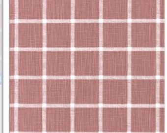May include: A pink and white plaid fabric with a subtle texture. The fabric has a white background with pink squares.