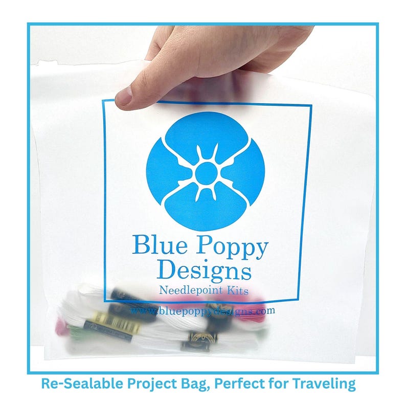 May include: A translucent re-sealable plastic project bag featuring a blue poppy flower logo, the text Blue Poppy Designs Needlepoint Kits, and the website bluepoppydesigns.com. Inside the bag are several bundles of colorful embroidery thread.