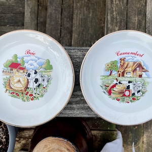 Vintage cheese plates, cow on farm, France, set of 2, Brie and Camembert, 7”, 1960s