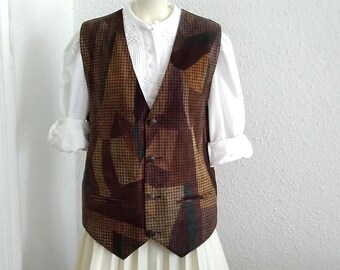 May include: A brown and beige patterned waistcoat with a V-neck and button fastening. The waistcoat is made of a soft, textured fabric.