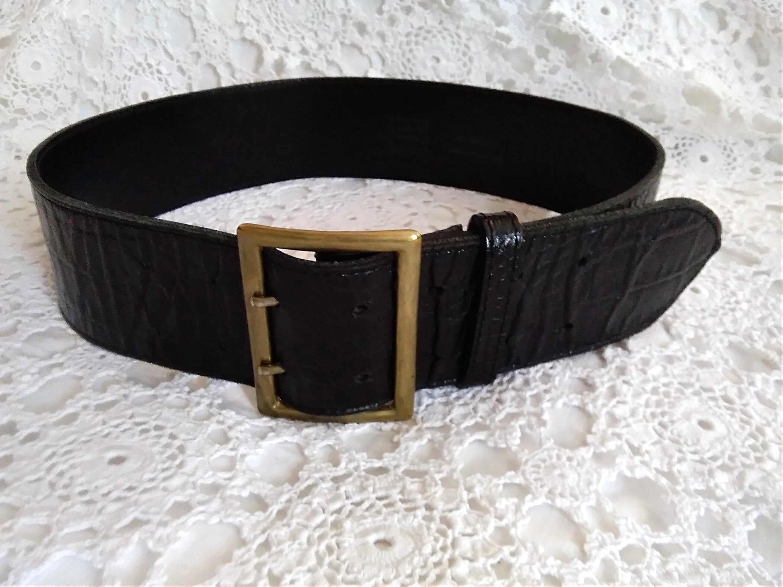 black jumpsuit, black and gold wide waist belt, Dooney & Bourke