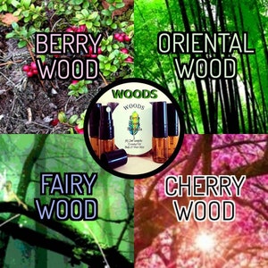 May include: Four small bottles of essential oil blends labelled "Berry Wood", "Oriental Wood", "Fairy Wood", and "Cherry Wood". The bottles are arranged in a circle around a label that reads "Woods Earth Tone Herbals (4) 2ml samples Essential Oil Body & Hair Mist"