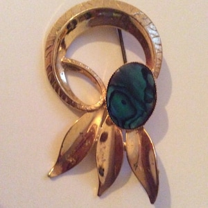 Gold and green enamel  brooch