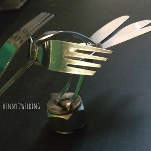 Metal Bird Sculpture: recycled Silverware.