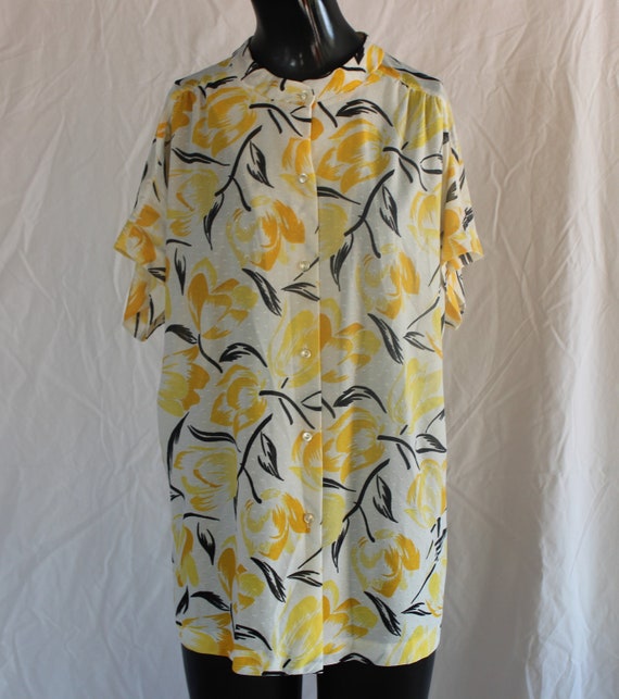 white blouse with yellow flowers