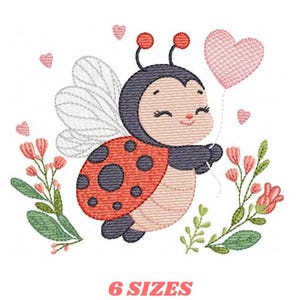 May include: An embroidered design of a smiling ladybug holding a pink heart-shaped balloon. The ladybug has a red shell with black spots and white wings. Pink hearts and flowers surround the ladybug. The text "6 SIZES" is at the bottom.