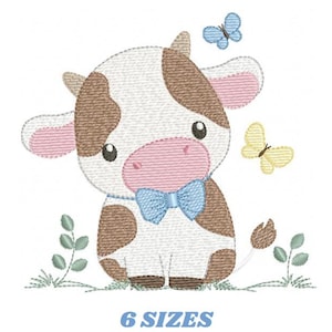 May include: An embroidered design of a cartoon cow with brown and white patches, a blue bow tie, and pink ears and nose. Two butterflies, one blue and one yellow, are also included. The text "6 SIZES" is written in blue below the cow.