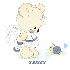 May include: A light yellow teddy bear holding a white bunny rabbit. The bear is wearing a blue and white striped dress. A yellow snail with a blue shell is crawling on the grass. The text "3 SIZES" is at the bottom of the image.
