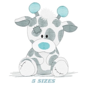 May include: A gray and white stuffed giraffe with blue ears and a blue nose. The giraffe is sitting down with its legs crossed. The giraffe has a patch on its eye and stitching on its feet. The text "5 SIZES" is below the giraffe.