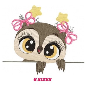 May include: Embroidered design of a brown owl with large eyes, pink bows, and yellow stars. The owl is peeking over a white surface.