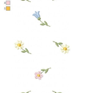 May include: Embroidered floral design featuring blue bellflowers, white daisies with yellow centers, and pink flowers. The design includes green stems and leaves. The text "FLORAL 16CM.hus" is at the bottom.