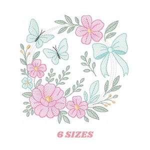 May include: An embroidered design featuring a wreath of pink flowers, green leaves, and light blue butterflies and a bow. The text "6 SIZES" is displayed below the wreath in pink.