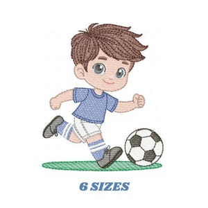 May include: An embroidered design of a cartoon footballer in a blue kit kicking a black and white football. The image includes the text "6 SIZES" in blue.