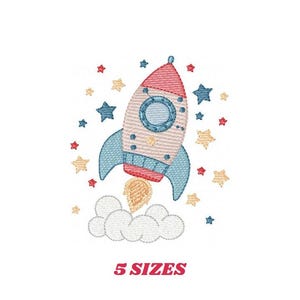 May include: Embroidered design of a red, white, and blue rocket ship taking off with a cloud of smoke. The rocket ship has a round window and is surrounded by yellow, blue, and red stars.