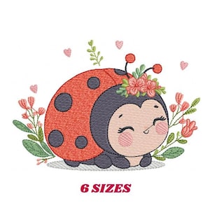 May include: Embroidered design of a cute ladybug with a flower crown, surrounded by pink flowers and green leaves. The ladybug is red with black spots and has a smiling face.