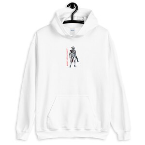 May include: White hooded sweatshirt with a graphic of a white and gray armored figure holding a weapon. The text "Clone Wars" is printed vertically on the left side of the figure.