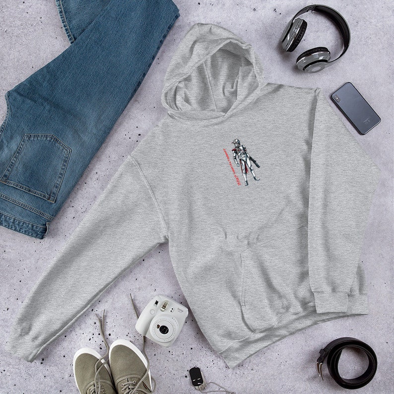May include: Gray hooded sweatshirt with a white and gray illustration of a character with a red text overlay that says "Always Coming Back".