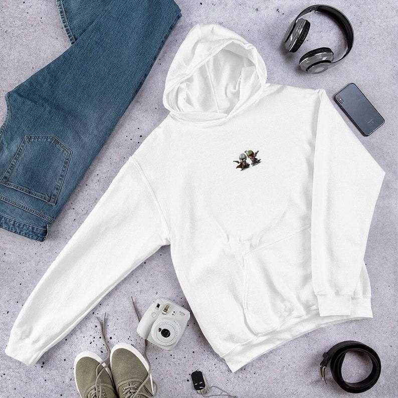 May include: White hooded sweatshirt with a small embroidered image of two cartoon characters on the chest.
