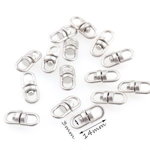 May include: A close-up of 18 silver swivel lobster clasps. The clasps are 14 mm long and 5 mm wide.