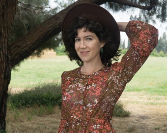 Vintage 60's fitted brown floral button up shirt with puff sleeves, waist tie and matching fabric covered buttons