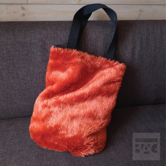 fluffy orange bag
