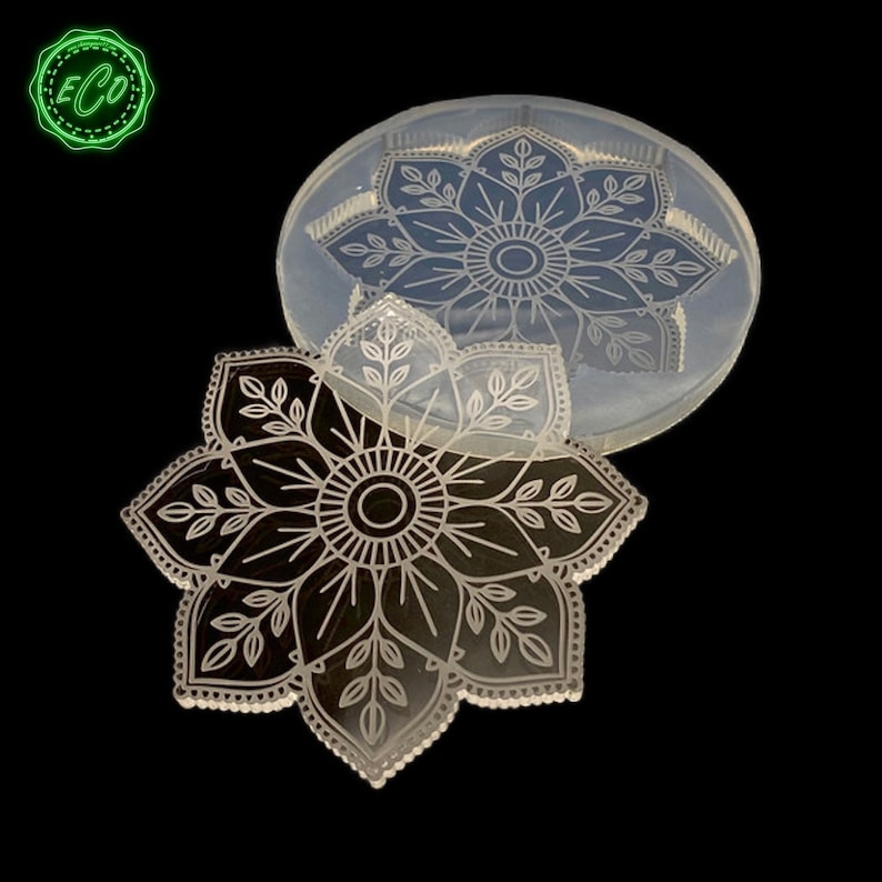 May include: A clear silicone mold with a detailed mandala design. The mold is used to create resin crafts.