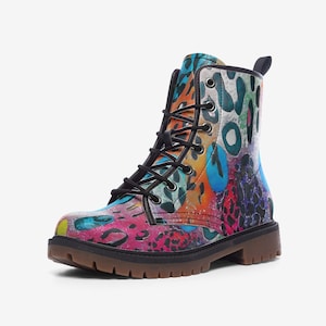 May include: Colorful patterned lace-up boots with a black sole. The boots feature a variety of animal prints, including leopard, cheetah, and zebra.